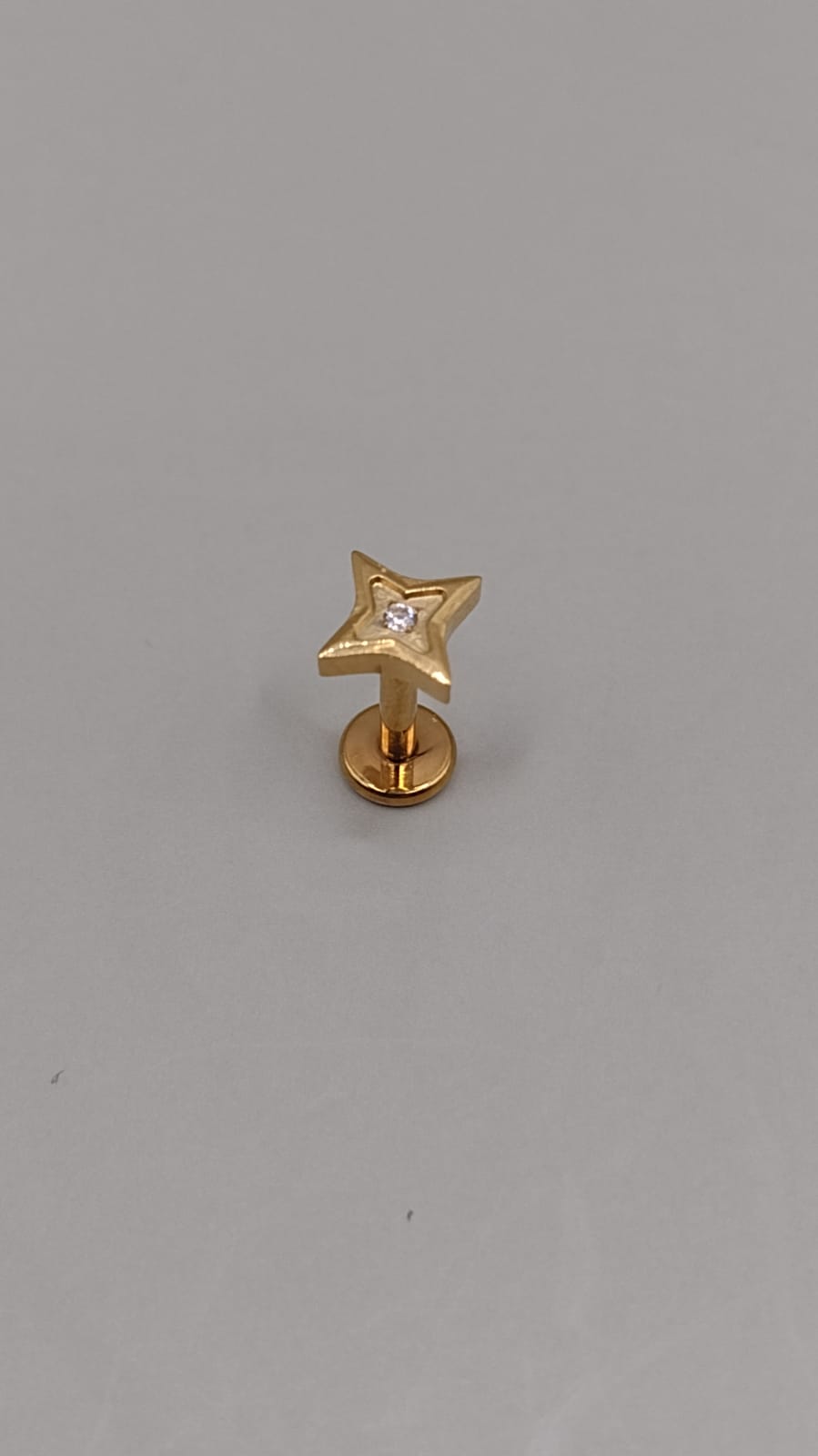 Piercing estrella zirconia dorada