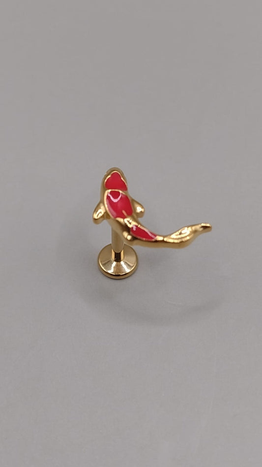 Piercing pez koi naranja